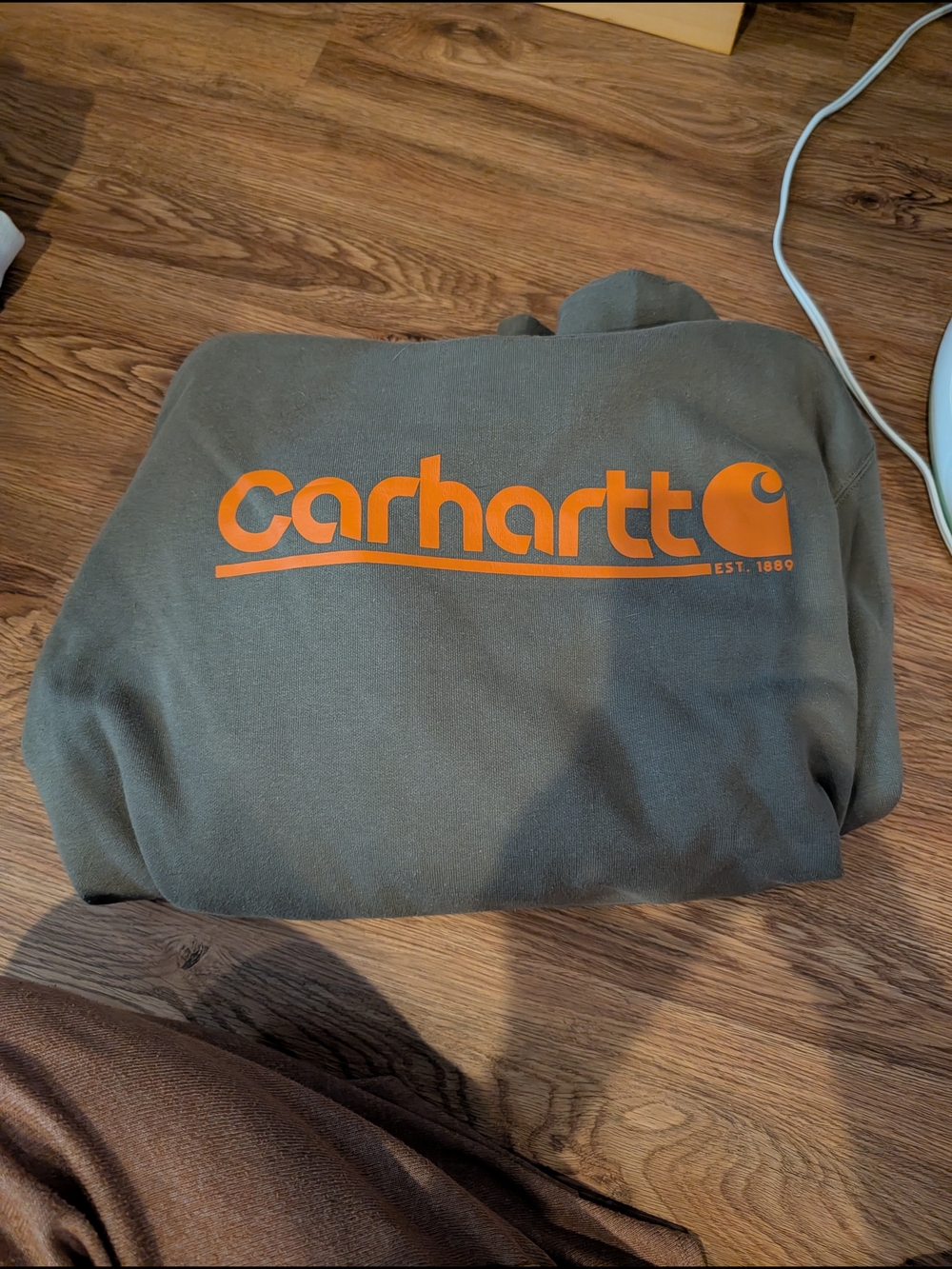 Carhartt Olive Green Pullover Hoodie with Orange Logo